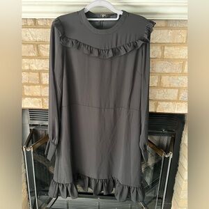 Who what wear black dress with ruffles never worn size med.